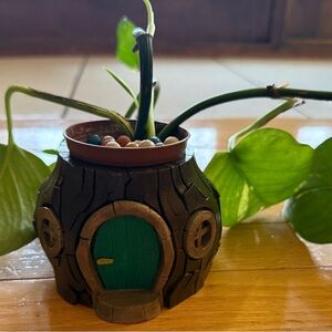 Whimsical Tree Stump Planter with Green Door